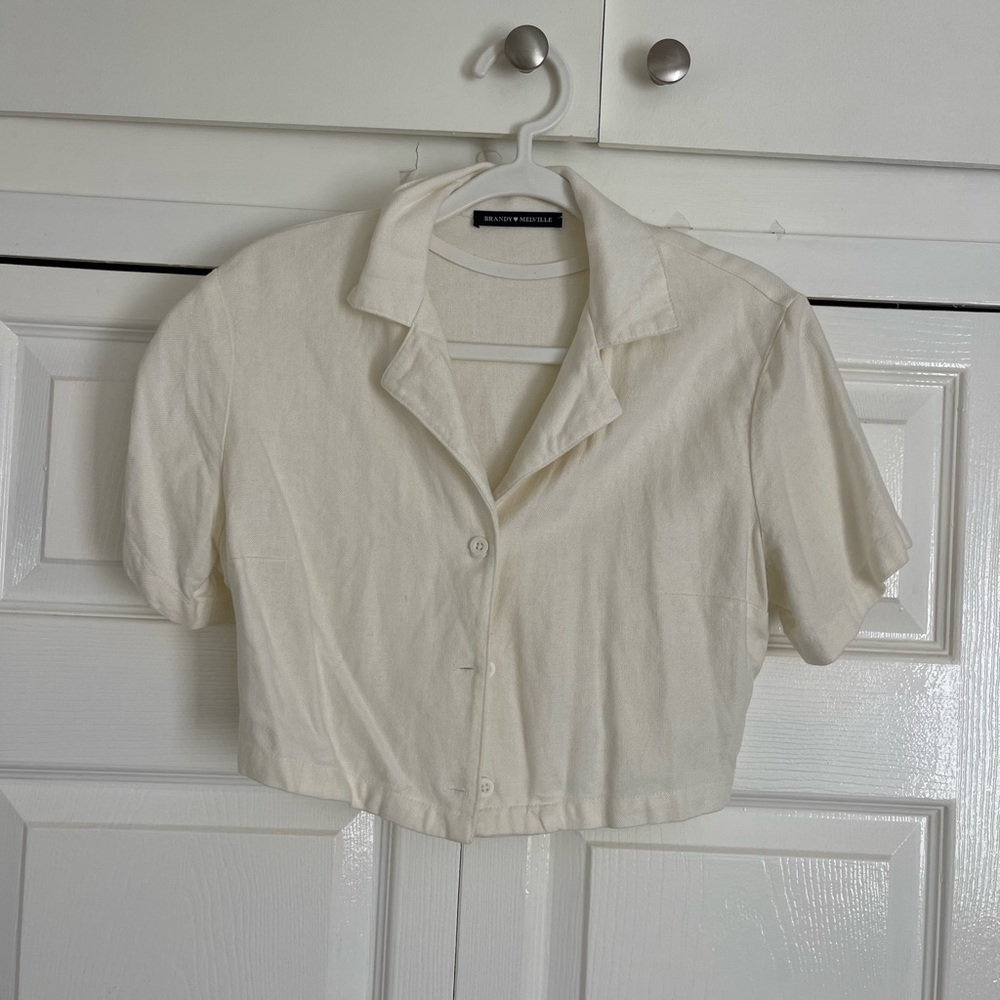 Brandy Melville cream button down top.